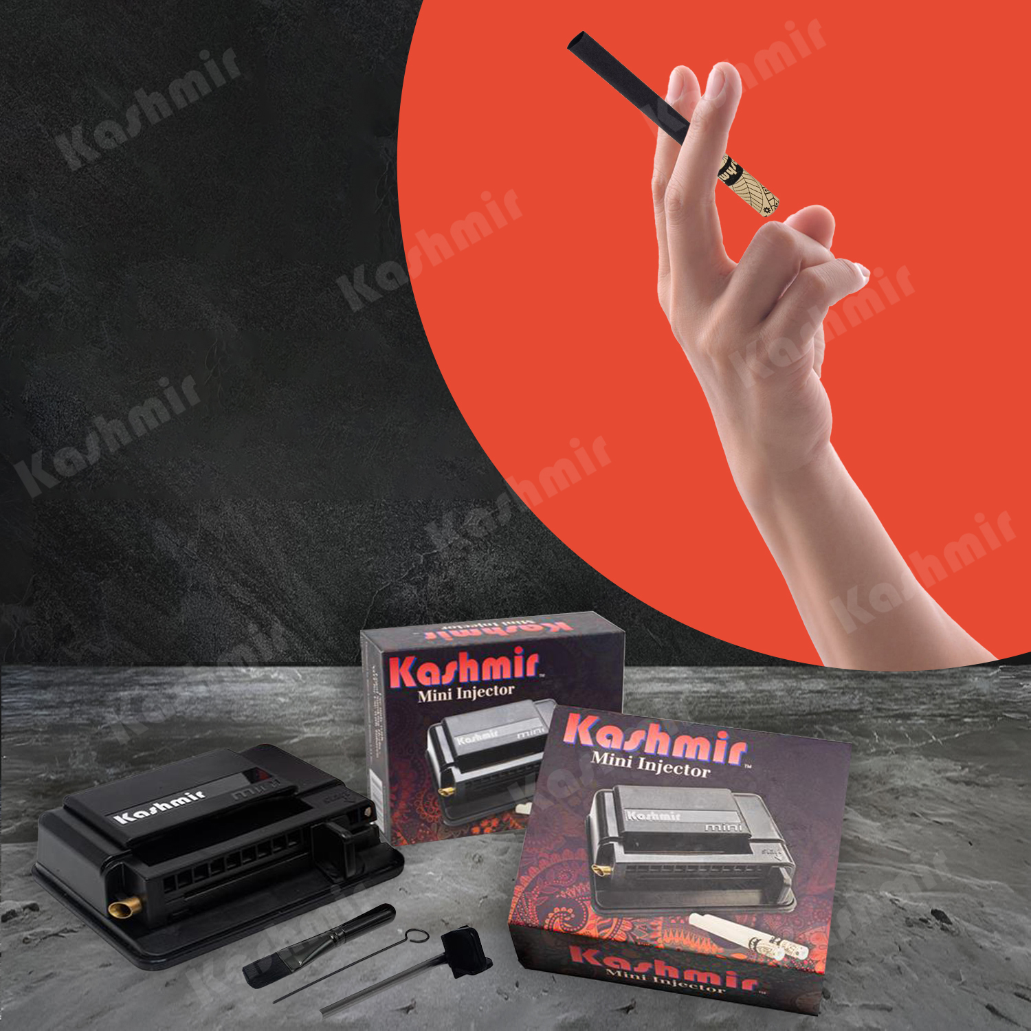 Hand holding a black Kashmir Onyx cigarette tube above a Kashmir Mini Injector with two boxes and included tools.