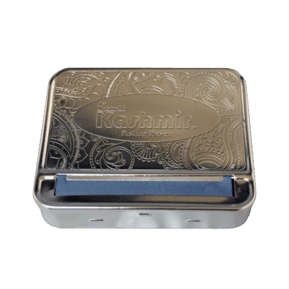 The Kashmir Automatic Rolling Machine, a sleek metal box for effortlessly rolling perfect cigarettes and joints.