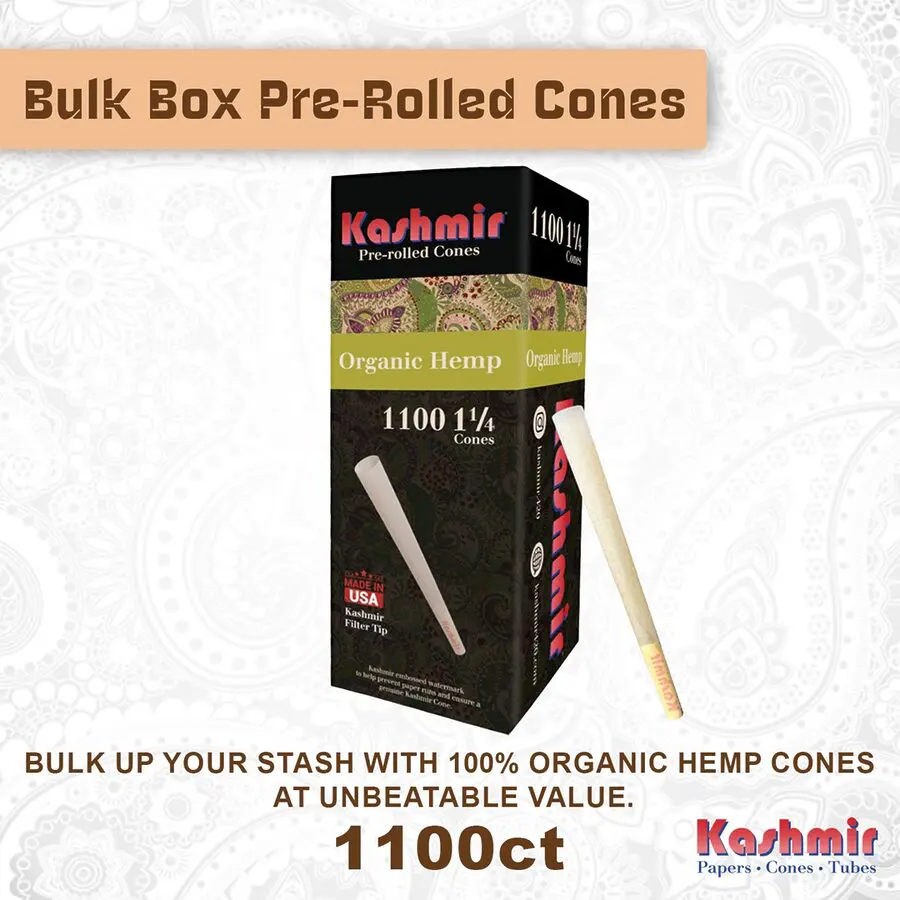 Kashmir Organic Hemp 1 1/4 pre rolled cones tower box, 1100-count bulk pack with natural tan paper and filter tip, shown in front 3/4 view — made in USA.