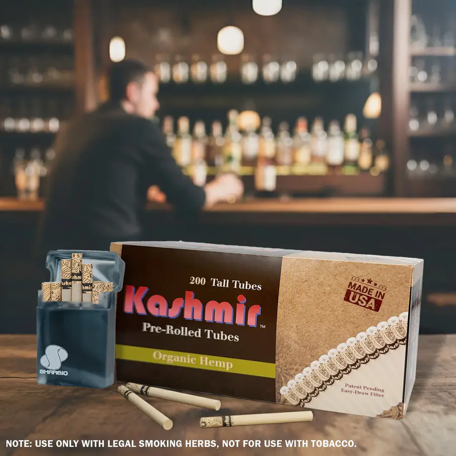 Kashmir Organic Hemp 200-count tube carton with an open pocket case of hemp tubes on a bar counter; Made in USA badge visible.